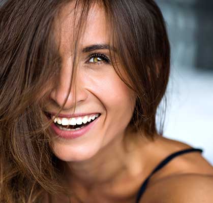 Woman smiling and laughing