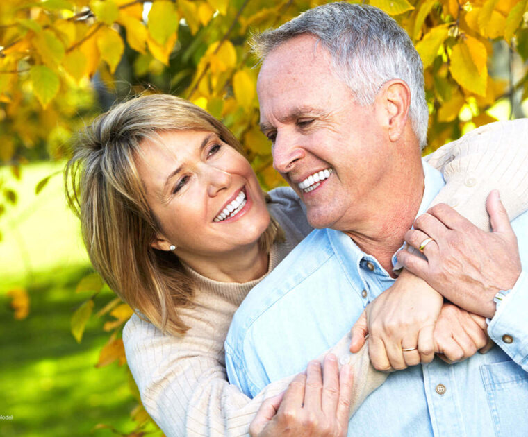 A mature couple hugging